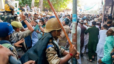 Bareilly: Security personnel lathi-charge protesters during a demonstration over the issue of 'I Love Mohammad' posters (Photo: PTI)