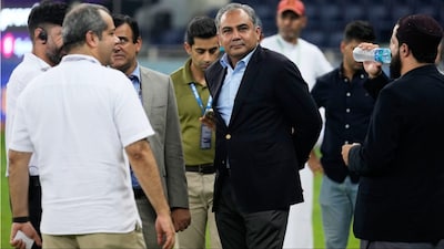 Mohsin Naqvi, center, stands with officials on the field after India won the Asia Cup cricket final against Pakistan (Photo: AP)