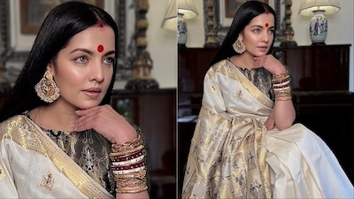 Celina Jaitly's Shashthi look balanced heritage and contemporary elegance.