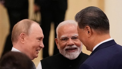 Flanked by Putin and Xi, PM Modi’s body language may have raised eyebrows in the White House but the carefully staged subtext was unmissable. (AP)