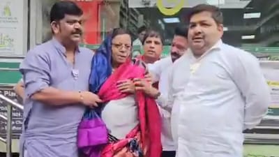 In the video shared on social media platforms, BJP workers can be seen holding Pagare in place at Manpada Road, while one of them draped a pink sari around him. (x)