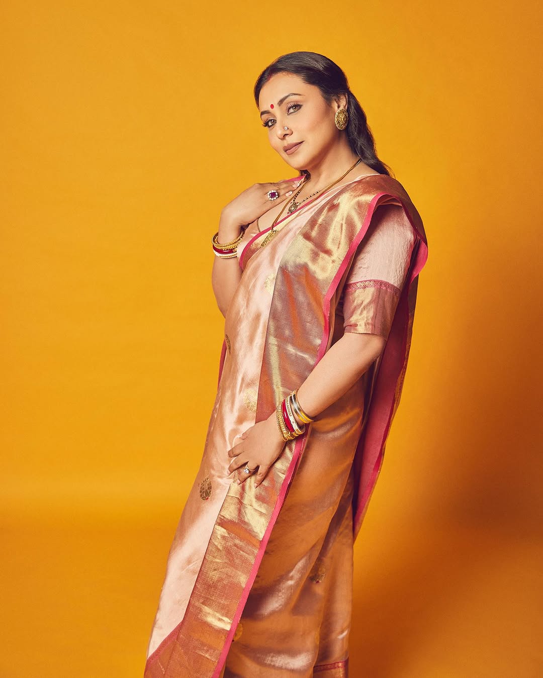 Silk Saree: Drape a silk saree in the classic Bengali style and complement it with elegant gold jewelry for a timeless, graceful look. (Image: Instagram) Silk Saree: Drape a silk saree in the classic Bengali style and complement it with elegant gold jewelry for a timeless, graceful look. (Image: Instagram)