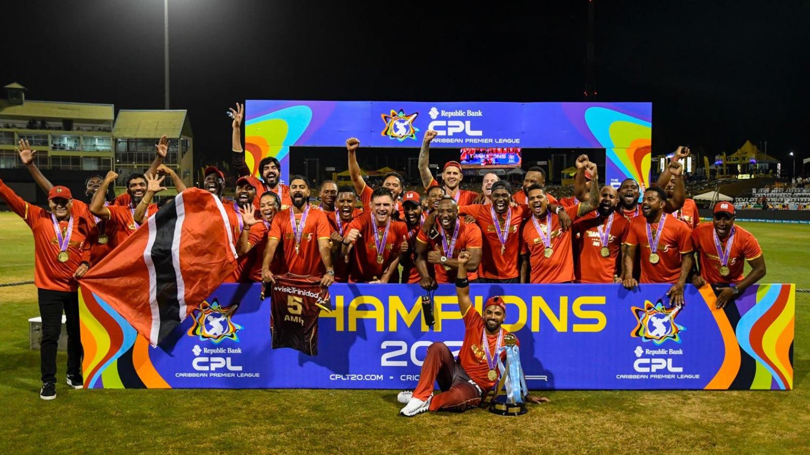 a cricket team celebrating victory