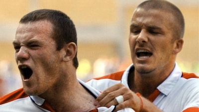 Wayne Rooney, David Beckham. (X) 