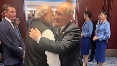 PM Narendra Modi hugs Russian President Vladimir Putin at the SCO Summit. 
