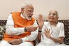 PM Narendra Modi with his late mother Heeraben. (Image: News18/File)