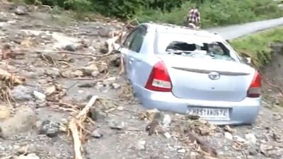  Many buses and vehicles were swept away in the strong flow of water.