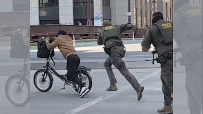 Despite the pursuit, the video does not show any physical contact between the agents and the cyclist. (Screengrab via X)