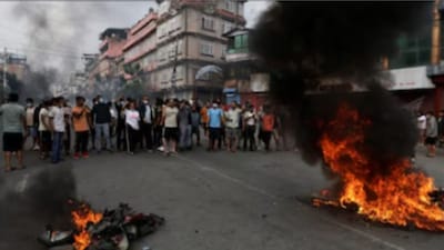 Demonstrators shout slogans against the Nepal government on Tuesday
