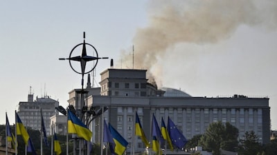 Smoke rises over the government headquarters in Kyiv, following Russian drone and missile strikes on September 7, 2025, amid the Russian invasion of Ukraine. (AFP)