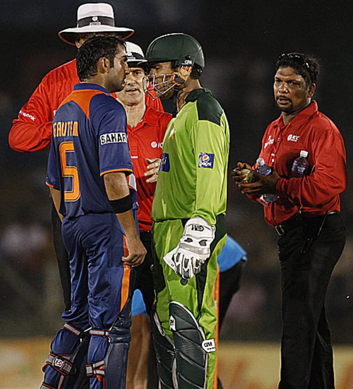 Gautam Gambhir vs Karman Akmal in 2010: One of the most heated moments in Asia Cup history came during the 2010 edition when Gautam Gambhir and Pakistan wicketkeeper Kamran Akmal clashed. The tension began after Akmal persistently appealed for caught behind decisions against Gambhir, first off Shahid Afridi and later off Saeed Ajmal, both of which were turned down by the umpire. Frustration mounted, and during the drinks break, the two players engaged in a fiery verbal spat that quickly drew attention. The altercation escalated to such an extent that Indian captain MS Dhoni, along with the on-field umpires, had to step in to diffuse the situation. Gautam Gambhir vs Karman Akmal in 2010: One of the most heated moments in Asia Cup history came during the 2010 edition when Gautam Gambhir and Pakistan wicketkeeper Kamran Akmal clashed. The tension began after Akmal persistently appealed for caught behind decisions against Gambhir, first off Shahid Afridi and later off Saeed Ajmal, both of which were turned down by the umpire. Frustration mounted, and during the drinks break, the two players engaged in a fiery verbal spat that quickly drew attention. The altercation escalated to such an extent that Indian captain MS Dhoni, along with the on-field umpires, had to step in to diffuse the situation.