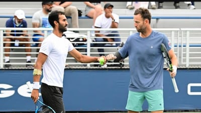 Yuki Bhambri and Michael Venus at the US Open (X)