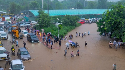 Gurugram's road network further complicates matters, lacking a clear grid and resulting in frequent traffic jams. (PTI/File)