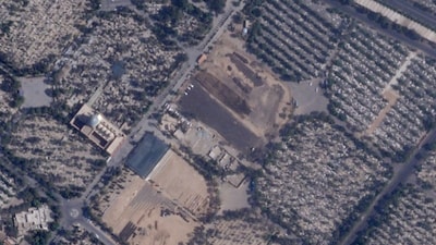 This satellite photo shows Iran paving over Lot 41, where some of those executed in the chaos after Iran's 1979 Islamic Revolution were buried. (Planet Labs PBC via AP)
