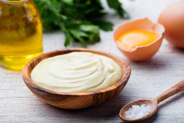 Ingredients: 1 egg yolk, 1 cup canola oil, 1 tbsp lemon juice or vinegar, ½ tsp mustard, salt to taste.