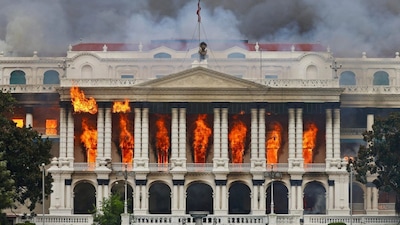 Fire rages through the Singha Durbar, the main administrative building for the Nepal government, in Kathmandu on September 9. (AFP photo)