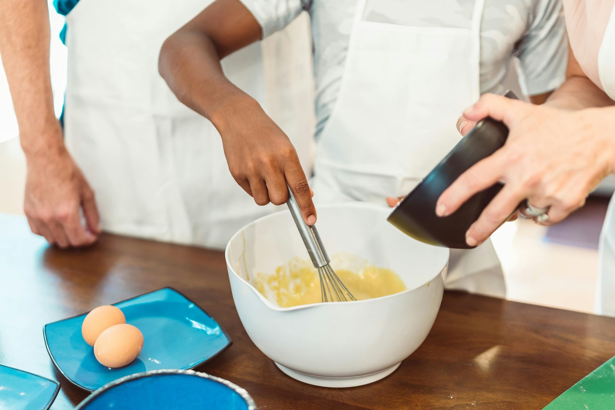 Step 3: Now, add oil very slowly in a thin stream while whisking continuously. Step 3: Now, add oil very slowly in a thin stream while whisking continuously.