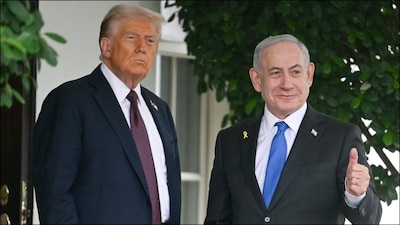 US President Donald Trump greets Israeli Prime Minister Benjamin Netanyahu at the White House. (AFP)
