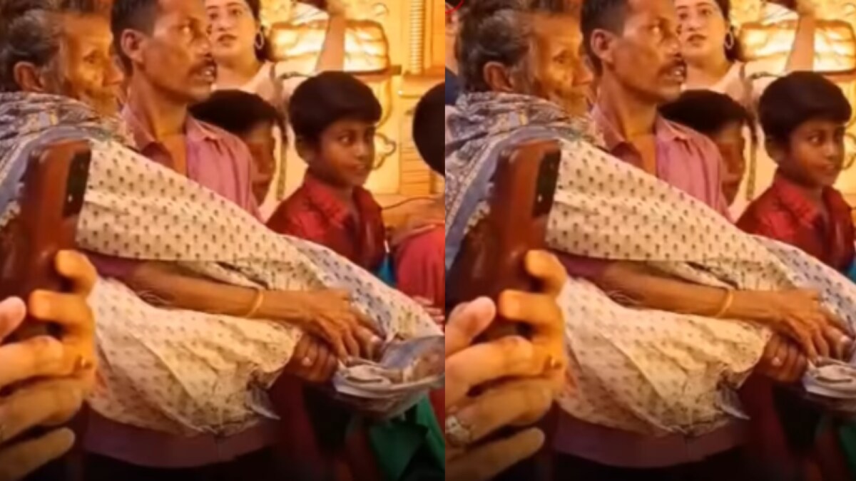 Devoted Son Carries Ailing Mother to Durga Puja