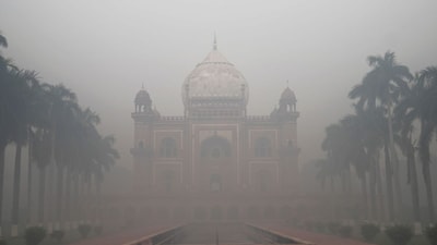 A view of Safdarjung's tomb amid low visibility as air quality deteriorates across Delhi-NCR on Oct 21, 2025. (PTI Photo)
