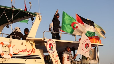 Crew interacts from aboard a boat, part of the Global Sumud Flotilla aiming to reach Gaza and break Israel's naval blockade, as it sails off Koufonisi islet, Greece, September 26, 2025. (REUTERS)