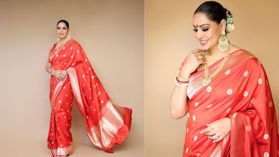 Bipasha Basu: The bold red hue, symbolic of strength, devotion, and the divine feminine, made the saree not just a fashion choice but also a cultural statement during Shubho Nobomi.