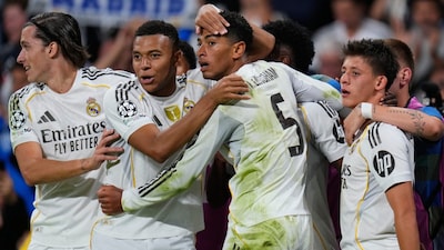 Jude Bellingham celebrates with teammates after scoring the only goal of the night. (AP Photo)