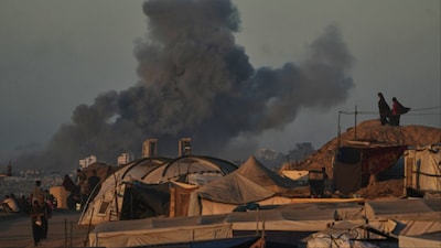 Smoke rises following an Israeli military strike in Gaza City (File photo/AP)