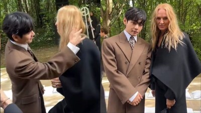 V helps Uma Thurman fix her hair at Paris Fashion Week. (Image: X)