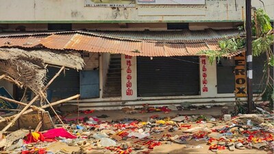 Karur: Footwear and other belongings of people, who attended actor Vijay's rally, lie on a road in the aftermath of the stampede (Photo: PTI)