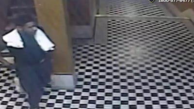 The suspect allegedly covered the victim’s mouth with one hand while squeezing her throat.
