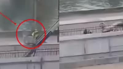 The clip shows two men dressed entirely in black making a surprisingly unhurried getaway.