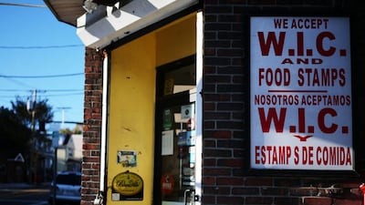 A sign advertises that WIC and Food Stamps are accepted at a convenience store, as tens of millions of Americans might not receive food stamps and other food aid in November because of the government shutdown. (REUTERS)