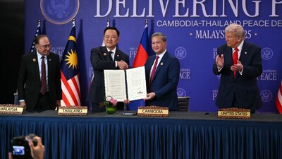 US President Donald Trump (R) claps as Thailand's Prime Minister Anutin Charnvirakul (2nd L) shakes hands with Cambodia's Prime Minister Hun Manet (2nd R) as Malaysia's Prime Minister Anwar Ibrahim during a ceremonial signing of a ceasefire agreement between Cambodia and Thailand on the sidelines of the 47th Association of Southeast Asian Nations (ASEAN) Summit in Kuala Lumpur. (IMAGE: AFP) 
