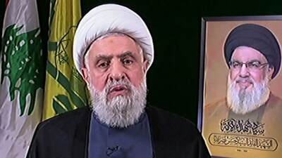 An image grab taken from Hezbollah's al-Manar TV shows the Lebanese group's new leader Naim Qassem during a televised address from an undisclosed location on October 30, 2024. (AFP)