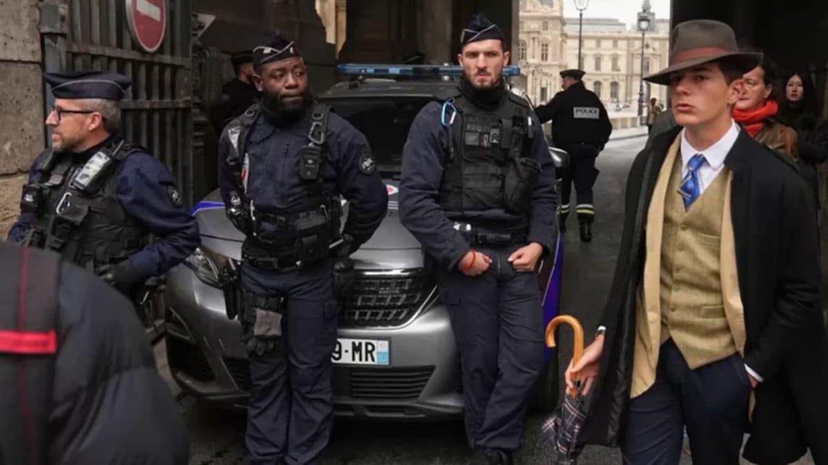 Mystery Man In Viral Photo After The Louvre Jewel Heist Creates A Buzz