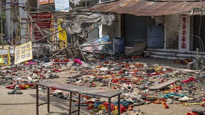 Footwear and other belongings of people lie on a road in the aftermath of stampede during a rally of actor and Tamilaga Vetri Kazhagam (TVK) chief Vijay, in Karur district, Tamil Nadu. (IMAGE: PTI/REPRESENTATIVE) 