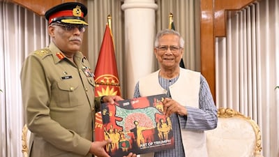 Bangladesh Chief Adviser Muhammad Yunus with Pakistani General Sahir Shamshad Mirza. (Image via X/@ChiefAdviserGoB)