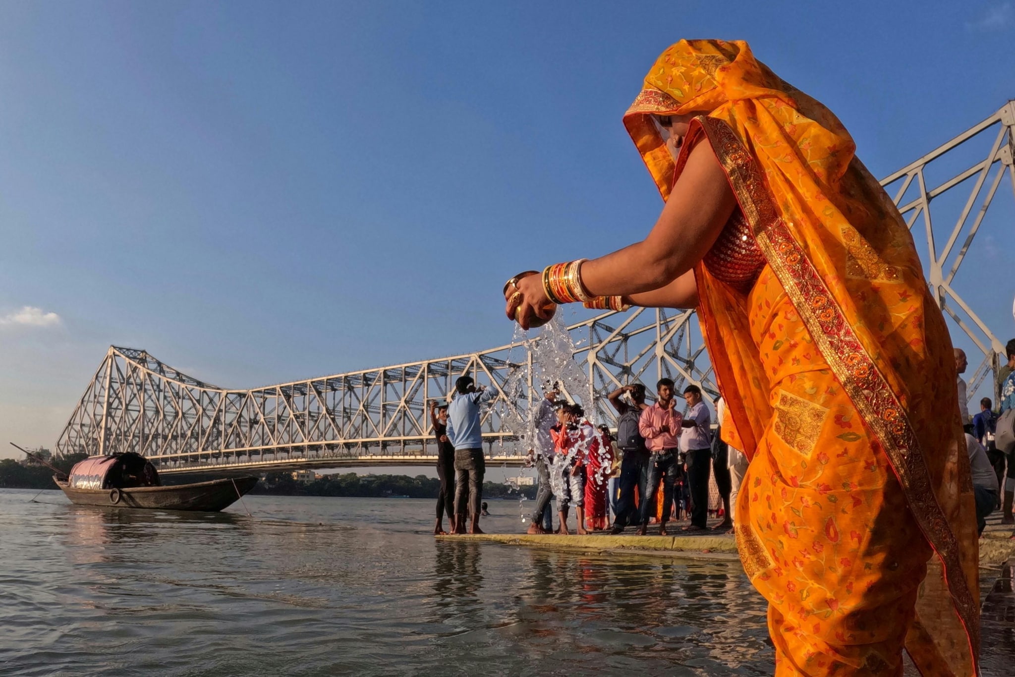 Women also sing hymns and praise Chhathi Maiya and the Sun God, creating a highly spiritual atmosphere. Women also sing hymns and praise Chhathi Maiya and the Sun God, creating a highly spiritual atmosphere.