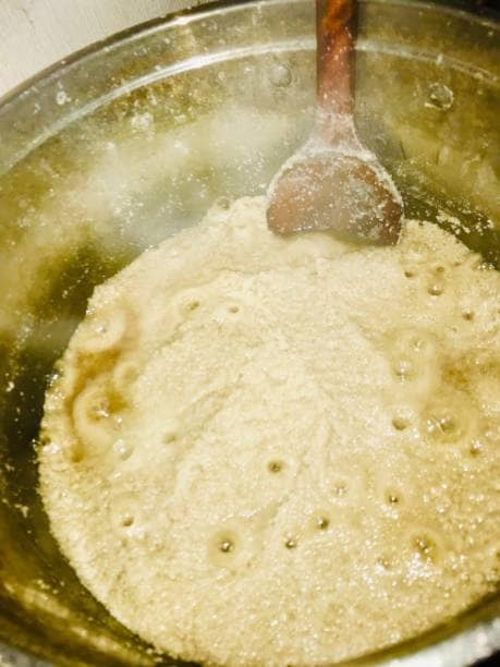 Heat some ghee and mix maida, atta, ajwain, kali mirch, kasuri methi, jeera, hing, and salt. Heat some ghee and mix maida, atta, ajwain, kali mirch, kasuri methi, jeera, hing, and salt.
