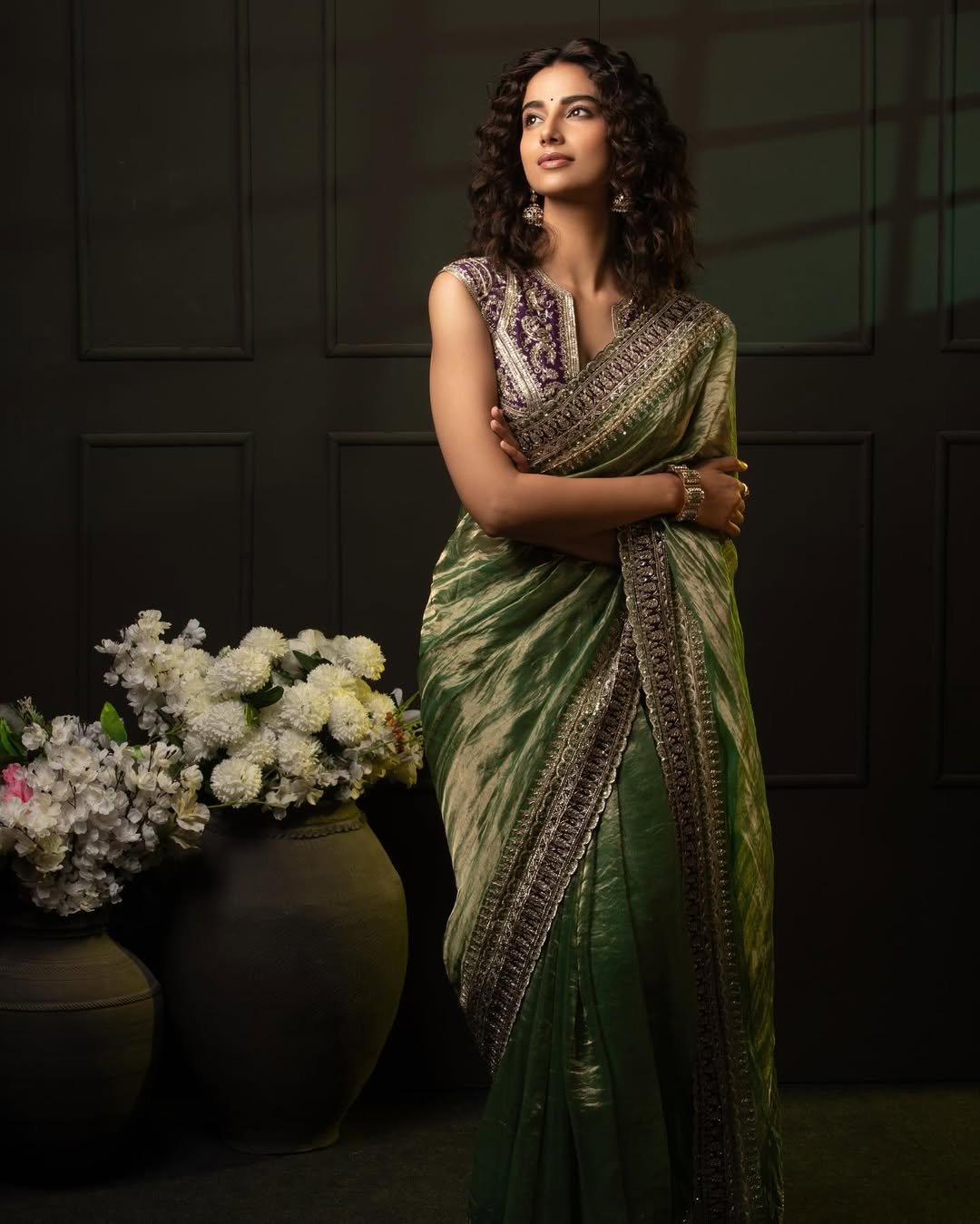 Nothing spells festive more than a tissue silk saree. Wear it with a contrasting yet complementing blouse to amp up the look further. Nothing spells festive more than a tissue silk saree. Wear it with a contrasting yet complementing blouse to amp up the look further.