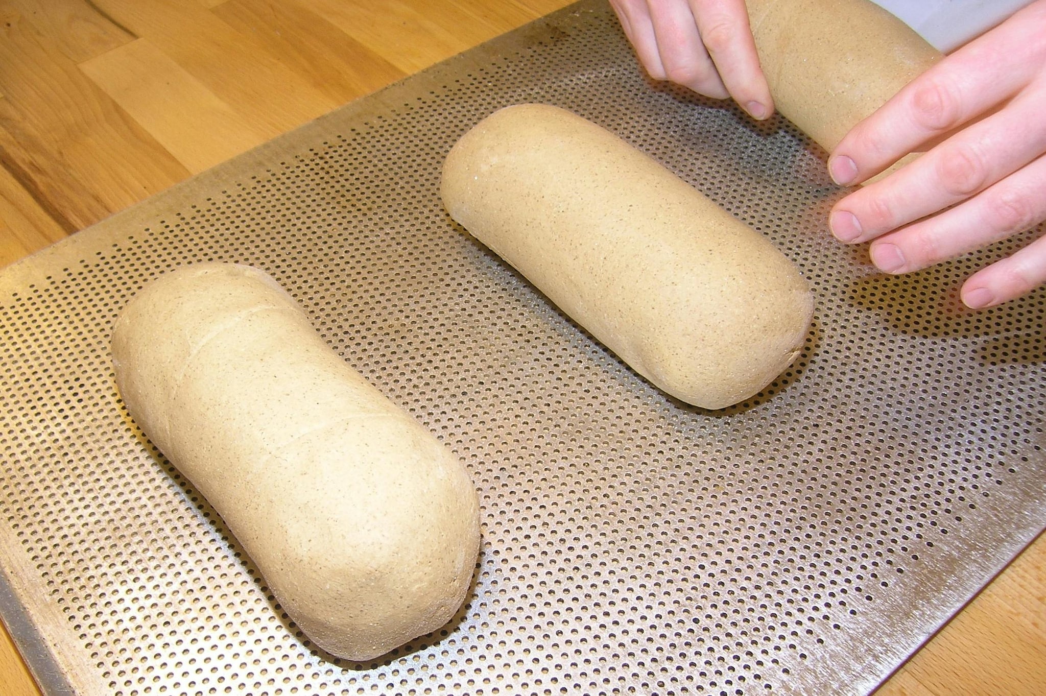 Now, knead the dough by adding warm ghee and water. Let the dough rest for 15 minutes. Now, knead the dough by adding warm ghee and water. Let the dough rest for 15 minutes.