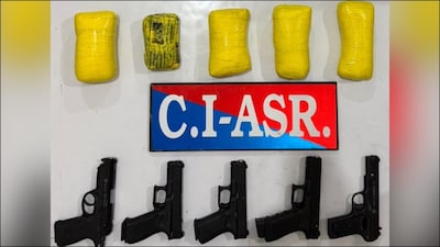 Police recovered 2.5 kg of heroin and five high-tech pistols. (Punjab Police)