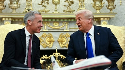 US President Donald Trump meets with Canadian Prime Minister Mark Carney in the Oval Office of the White House in Washington. (AFP photo)