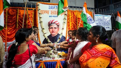 BJP workers pay tribute to Bankim Chandra Chatterjee, writer of the national song Vande Mataram, during celebrations to mark 150 years of the song.  (PTI Photo)