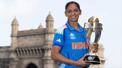Indian women's cricket team captain Harmanpreet Kaur poses for a photo with Women's ODI World Cup trophy. (Picture Credit: X/@BCCI)