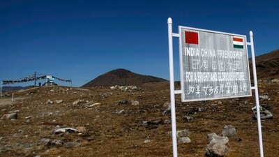 A signboard is seen from the Indian side of the Indo-China border at Bumla, in the northeastern Indian state of Arunachal Pradesh, 2009. (REUTERS)