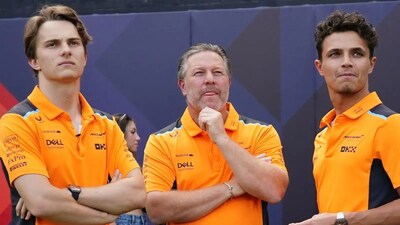McLaren's Oscar Piastri, Zak Brown and Lando Norris (X)