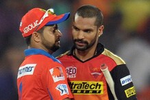 Gujarat Lions captain Suresh Raina(L) greets Sunrisers Hyderabad batsman Shikhar Dhawan after winning the match during the 2016 Indian Premier League (IPL) Twenty20 cricket match between Sunrisers Hyderabad and Gujarat Lions at The Rajiv Gandhi International Stadium in Hyderabad on May 62016. ----IMAGE RESTRICTED TO EDITORIAL USE - STRICTLY NO COMMERCIAL USE----- (Photo by NOAH SEELAM / AFP)