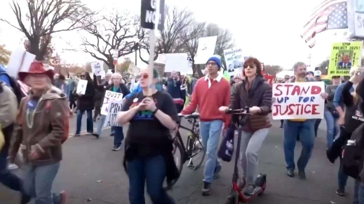 ‘Impeach, Convict, Remove’: Thousands March Against Trump In Washington